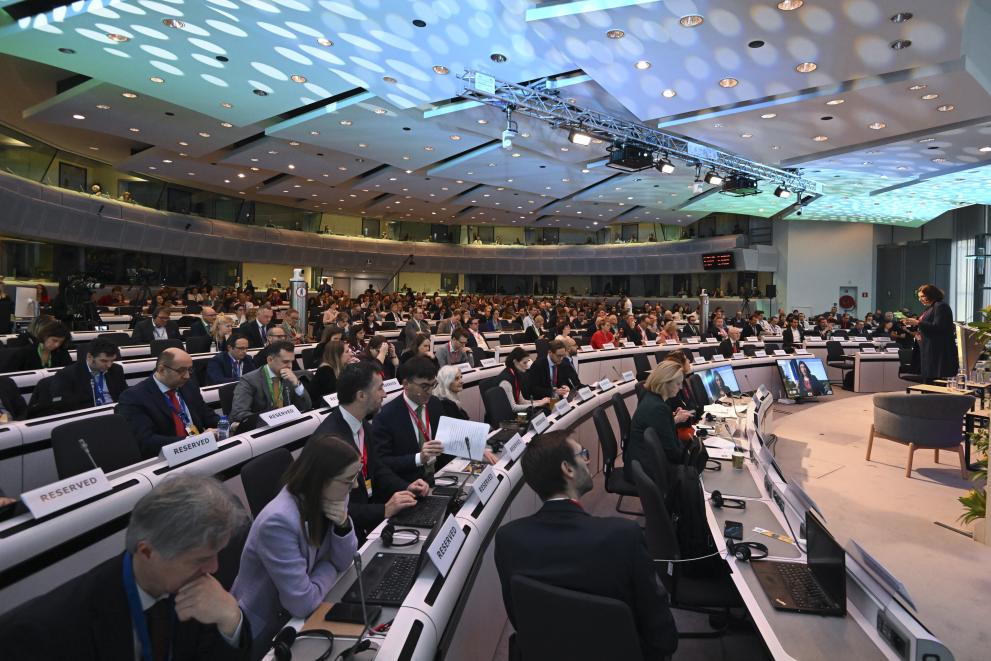 Charlemagne building conference hall and seated delegates