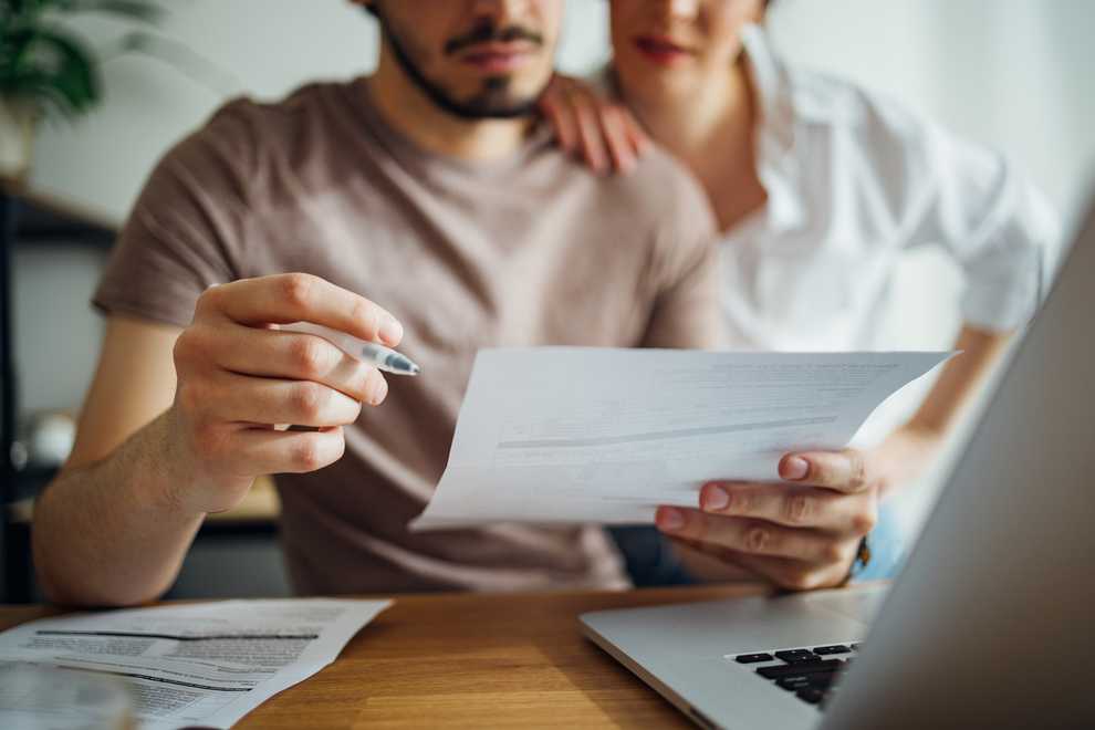 man contemplating taking peer-to-peer (P2P) loan