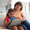 Mother and Daughter Using a Tablet Together