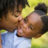 Mother Kissing Daughter in Green