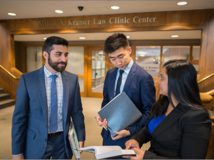 Students standing outside of the Milton A. Kramer Law Clinic Center