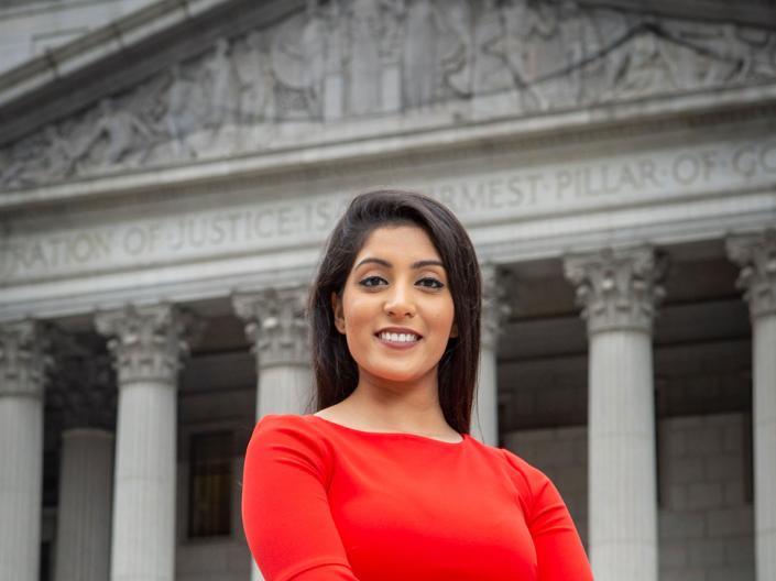 Image of a CWRU law student outside of a justice building