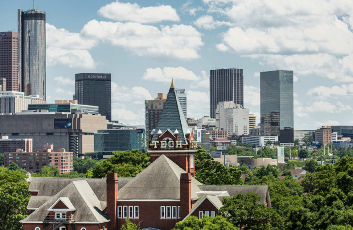 image of Atlanta skyline shot from Georgia Tech's campus, with Tech Tower appearing in the lower half of the image.