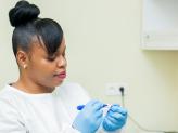 Fortunate Maluwa – Laboratory technician MSF, labeling HPV samples.