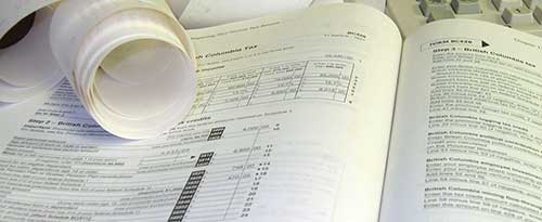 tax book, receipts, and keyboard