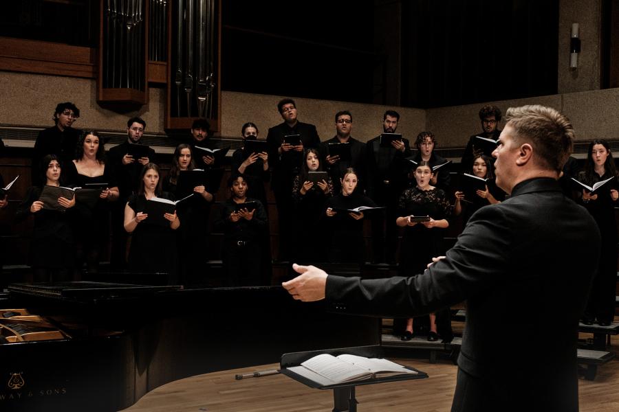 J.D. Burnett conducting the UT Concert Chorale in concert.