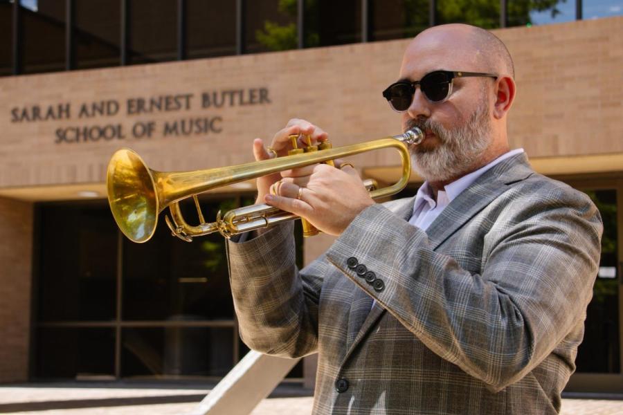 UT alumni and leader of the UT Jazz Trumpet Studio Dr. Michael Sailors performs an excerpt from his new album outside of the Butler School of Music on Sept. 9, 2024.