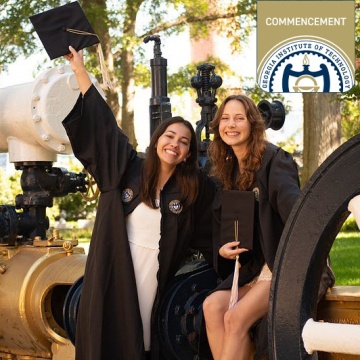 students posing in regalia