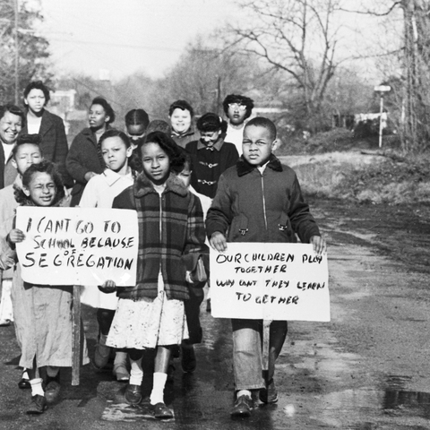 Mothers and Children marching for the right to an education