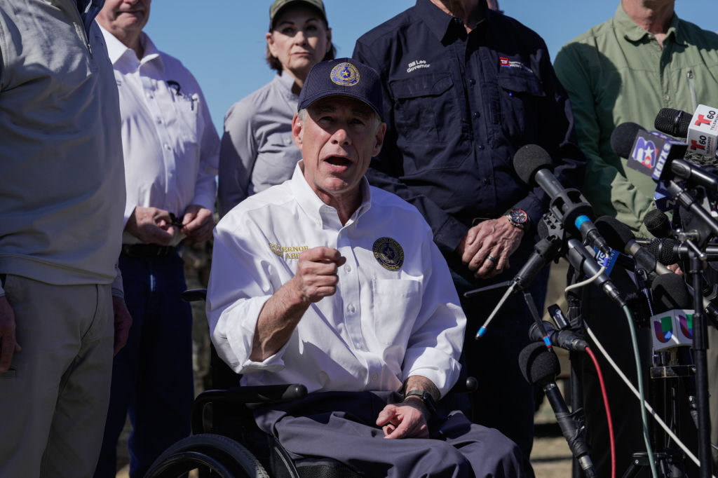 Texas Gov. Greg Abbott, who signed the state measure into law, speaks at a press conference along the Rio Grande at the U.S.-Mexico border Sunday in Eagle Pass, Texas. 