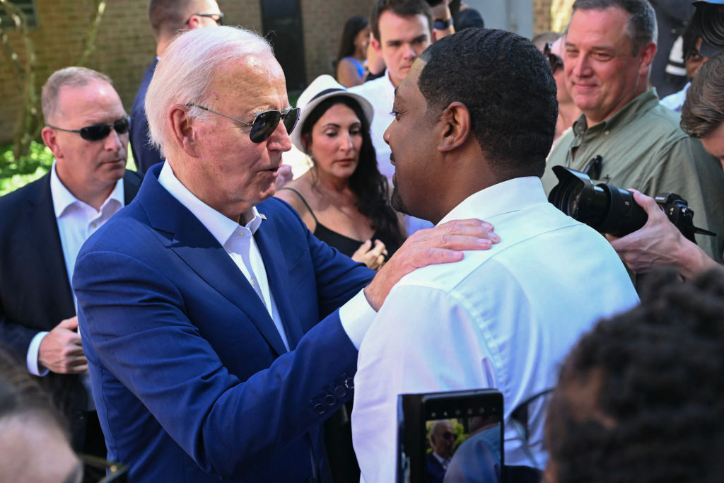 President Joe Biden greets supporters and volunteers during a campaign stop at a Biden-Harris campaign office in Harrisburg, Pa., on Sunday. 