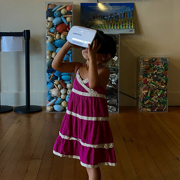 girl wearing vr goggles