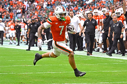 Xavier Restrepo runs toward the End Zone