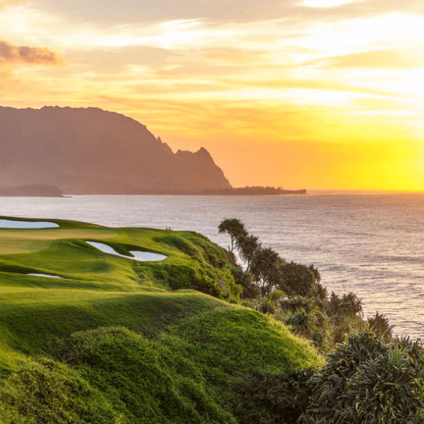 sunset over a golf course