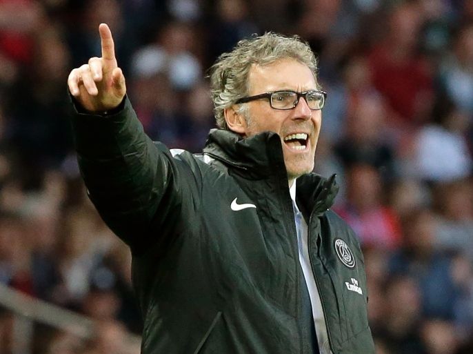 Paris Saint Germain's coach Laurent Blanc, gestures during the League One soccer match between Paris Saint Germain and Guingamp, at the Parc des Princes stadium, in Paris, France, Friday, May 8, 2015. (AP Photo/Thibault Camus)