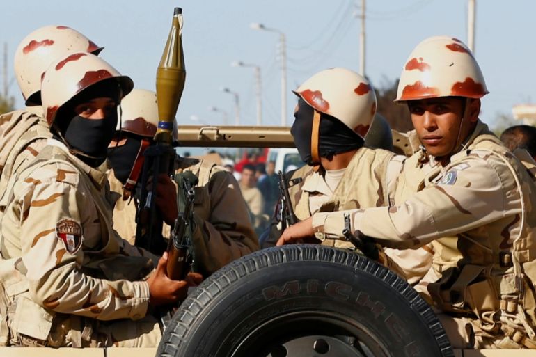 Military forces look on in North Sinai