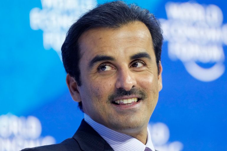 The Emir of Qatar, Sheikh Tamim bin Hamad Al Thani smiles during the World Economic Forum in Davos, Switzerland