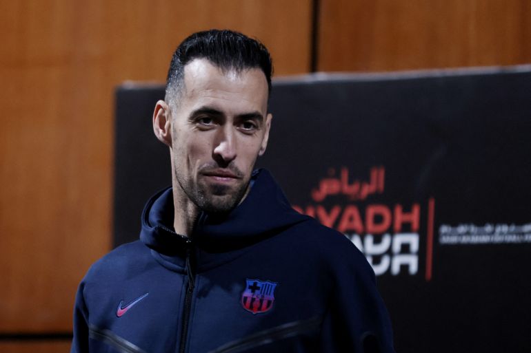 Busquets at a press conference