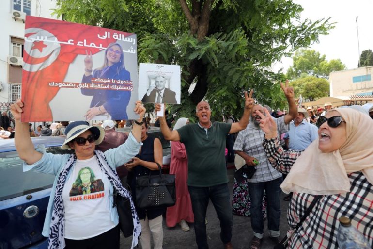 epa10743422 Supporters of the Tunisian National Salvation Front opposition coalition and families of political detainees carry placards with photos of political prisoners as they protest outside the Court of Appeal, as part of the review of requests for release in Tunis, Tunisia, 13 July 2023. Protesters demanded the release of opposition members in custody. EPA-EFE/MOHAMED MESSARA