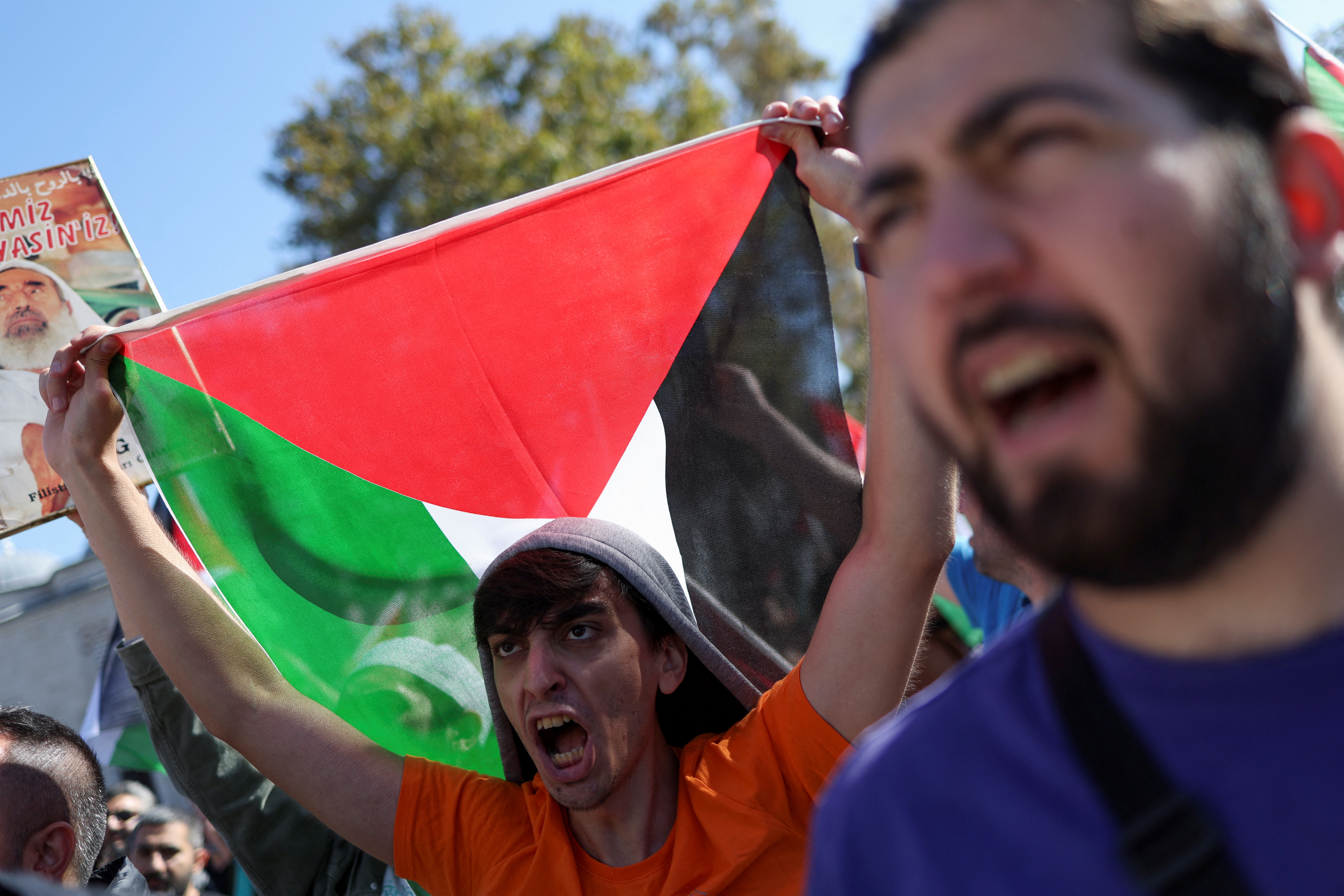 People attend a demonstration to express solidarity with Palestinians in Gaza, amid the ongoing conflict between Israel and the Palestinian Islamist group Hamas, in Istanbul,