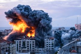 Smoke and flames billow after Israeli forces struck a high-rise tower in Gaza City