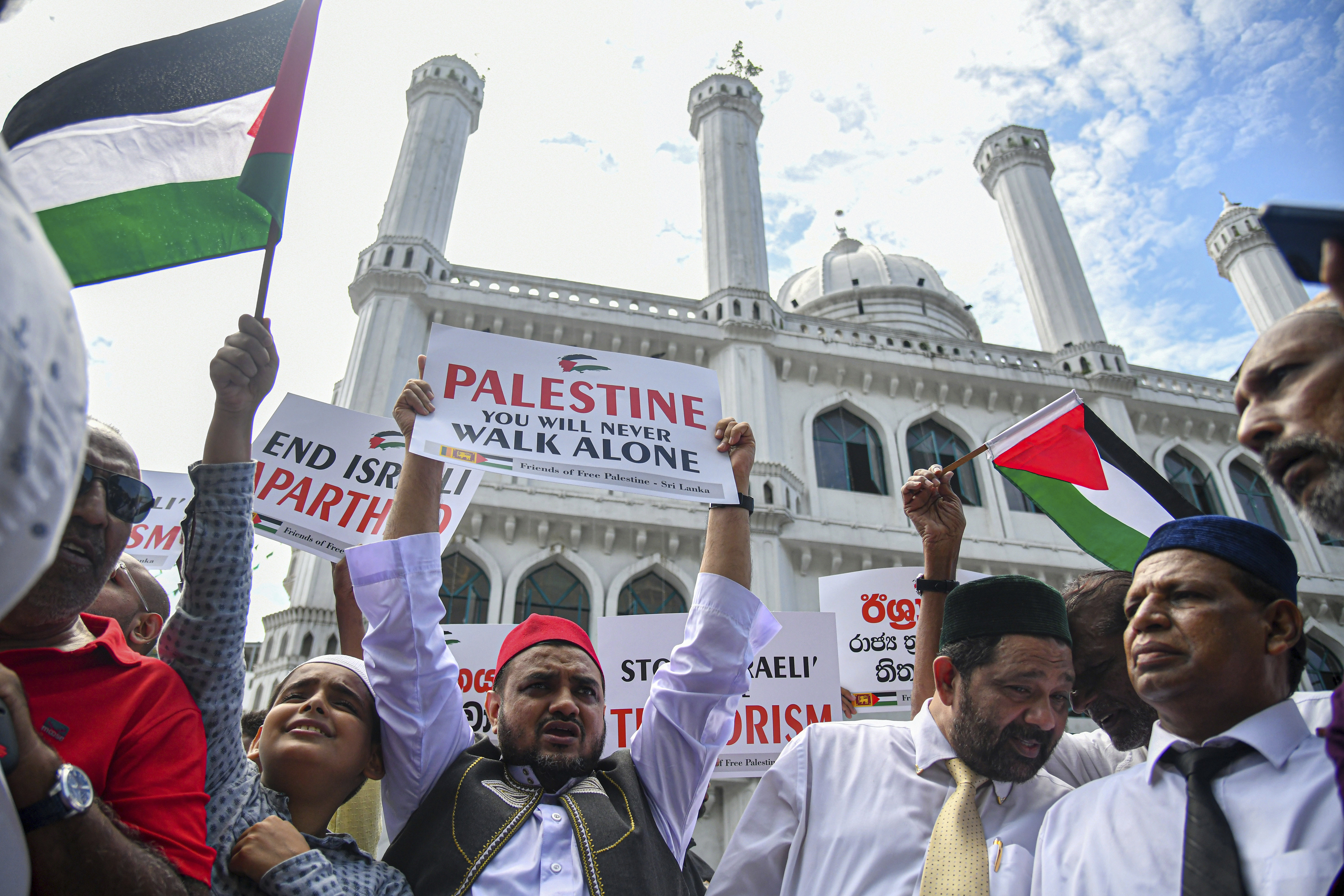 Sri Lankan Muslims participate in a protest against Israeli airstrikes on Gaza