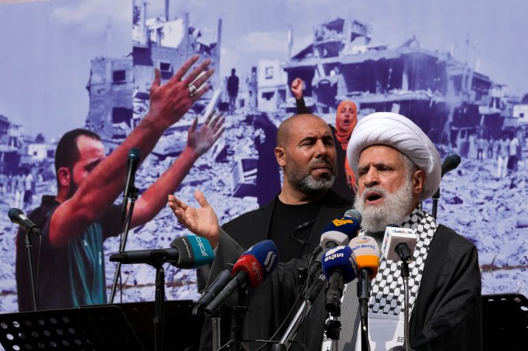 Sheik Naim Kassem, Hezbollah's deputy leader addresses a speech during a protest in Beirut.