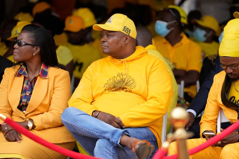 Zimbabwe opposition figure Job Sikhala, centre, attends a political rally in Harare, Zimbabwe