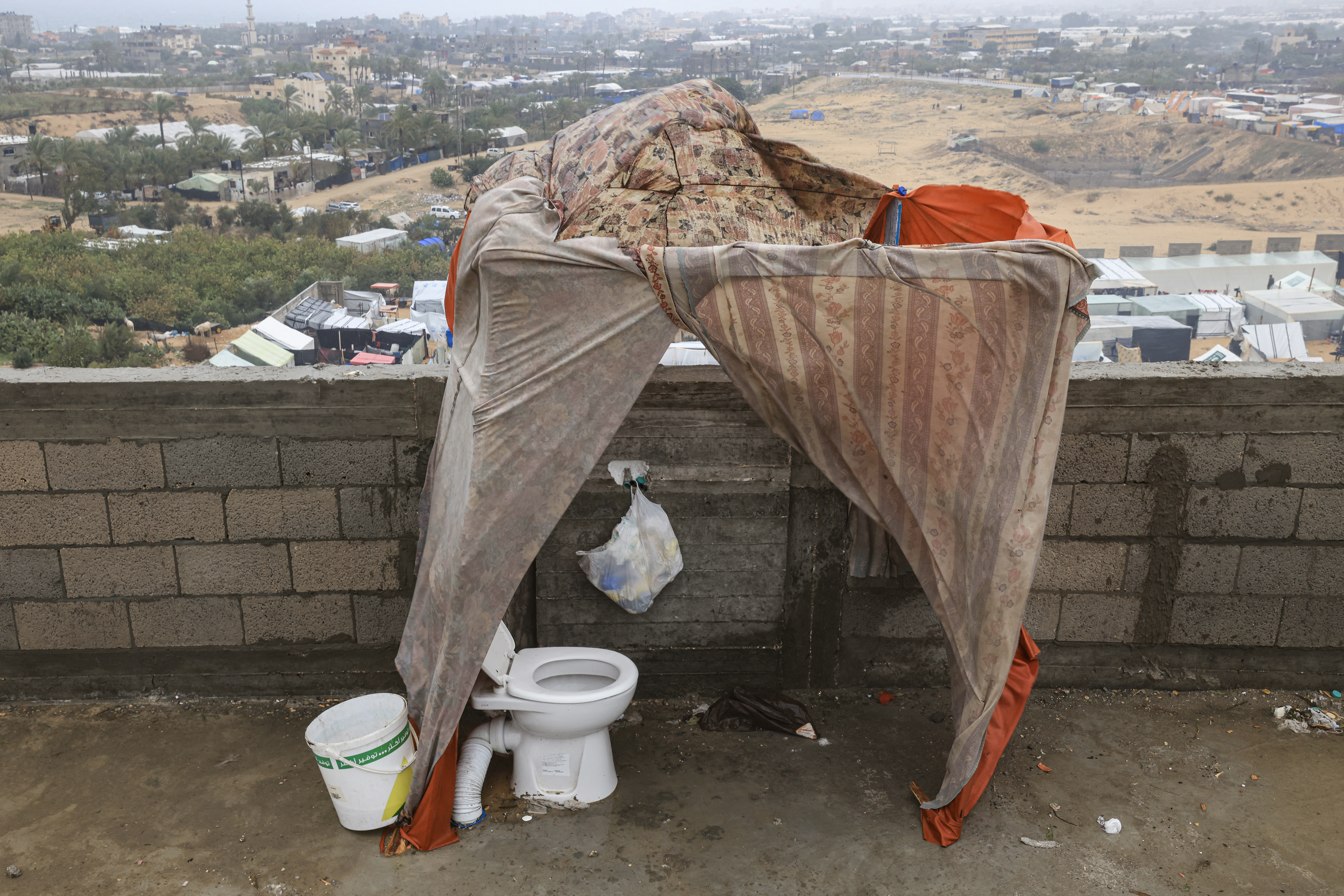 Makeshift toilets are pictured at a camp for displaced people in Rafah, in the southern Gaza Strip where most civilians have taken refuge.