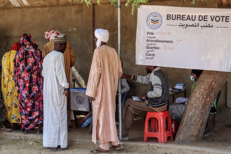 People at a polling station