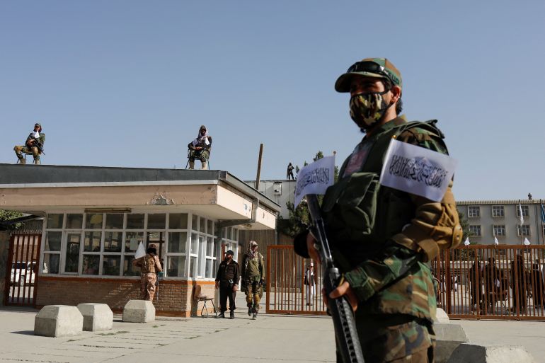 Taliban soldiers stand guard at the second-anniversary ceremony of the takeover of Kabul by the Taliban in Kabul, Afghanistan, August 15, 2023. REUTERS/Ali Khara