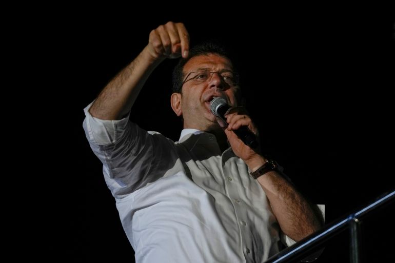 Istanbul Mayor and Republican People's Party, or CHP, candidate Ekrem Imamoglu addresses supporters outside the City Hall in Istanbul, Turkey, early Monday, April 1, 2024.