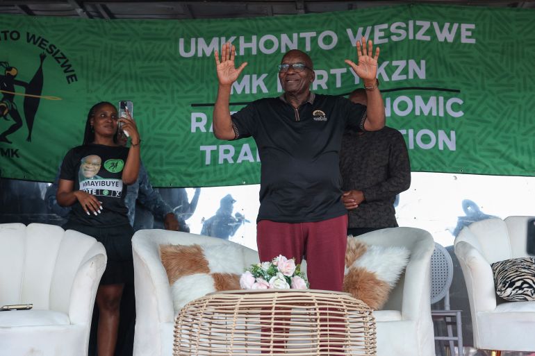 Former South African President Jacob Zuma and member of the newly formed opposition party uMkhonto we Sizwe (MK) Party waves to supporters during an election rally outside his homestead in Nkandla, KwaZulu-Natal on April 25, 2024. (Photo by Phill Magakoe / AFP)