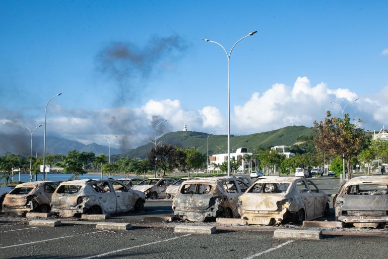 Burnt out vehicles in Noumea