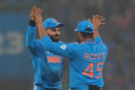 India's captain Rohit Sharma, right, greet India's Virat Kohli after India won their ICC Men's Cricket World Cup match against England in Lucknow, India, Sunday, Oct. 29, 2023.(AP Photo/Manish Swarup)