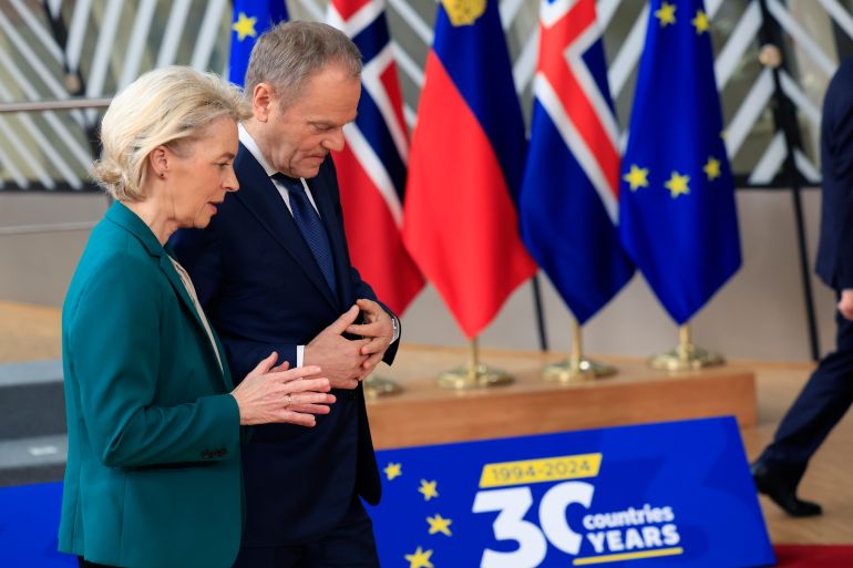 Ursala von der leyen and Poland PM Donald Tusk chat