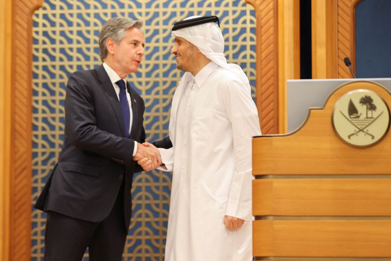 Antony Blinken shakes hands with Sheikh Mohammed Bin Abdulrahman al-Thani