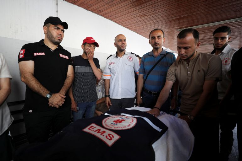 Mourners attend the funeral of Palestinian Hani Al-Jaafarwi