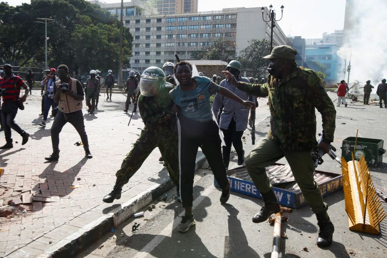 Protester grabbed by police in Kenya's capital Nairobi