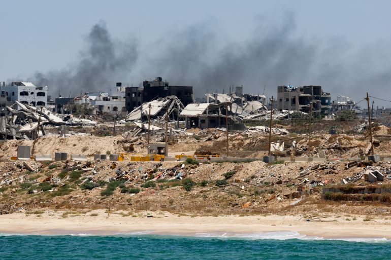 FILE PHOTO: Destroyed buildings are pictured in Gaza, amid the ongoing conflict between Israel and Hamas, as seen near the Gaza coast, June 25, 2024. REUTERS/Amir Cohen/File Photo