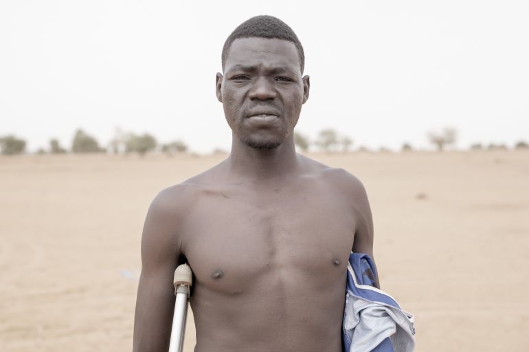 Sudanese refugee, Yahiya Adam, poses for the camera in eastern Chad.