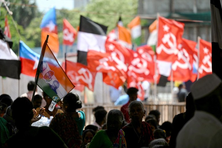 Supporters of India's opposition parties, Indian National Congress (INC) and Communist Party of India