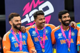 Virat Kohli, Hardik Pandya and Jasprit Bumrah had all the reasons to celebrate after leading India&#039;s title-winning charge at the ICC Men&#039;s T20 World Cup 2024 final at the Kensington Oval in Bridgetown, Barbados on June 29, 2024 [Randy Brooks/AFP]