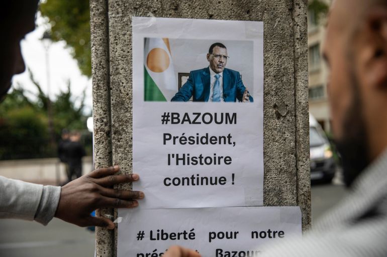 Demonstrators gather in front of the Embassy of Niger in Paris, in support of Nigerien President Mohamed Bazoum