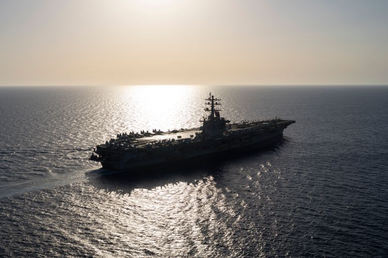 The USS aircraft carrier Dwight D. Eisenhower sails in the Red Sea on Wednesday, June 12