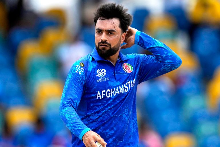 Afghanistan's captain Rashid Khan reacts after bowling a delivery during the ICC Men's T20 World Cup cricket match between Afghanistan and India at Kensington Oval in Bridgetown, Barbados, Thursday, June 20, 2024. (AP Photo/Ricardo Mazalan)