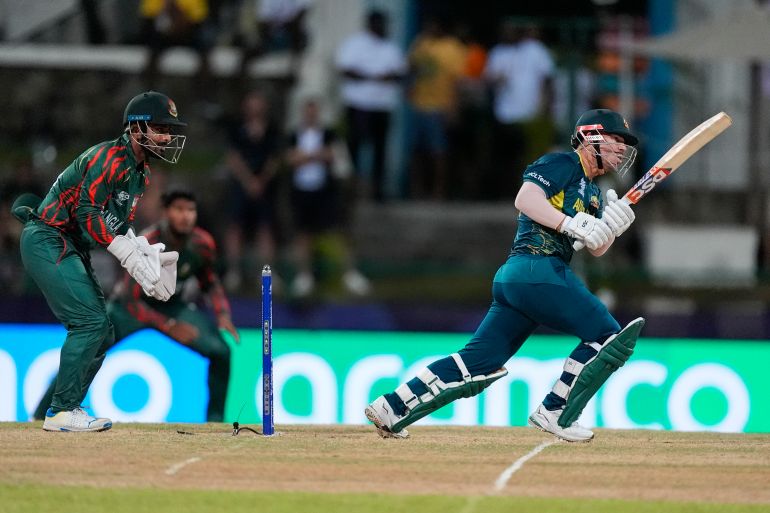 Australia's David Warner bats during the ICC Men's T20 World Cup cricket match between Australia and Bangladesh in North Sound, Antigua and Barbuda, Thursday, June 20, 2024. (AP Photo/Lynne Sladky)