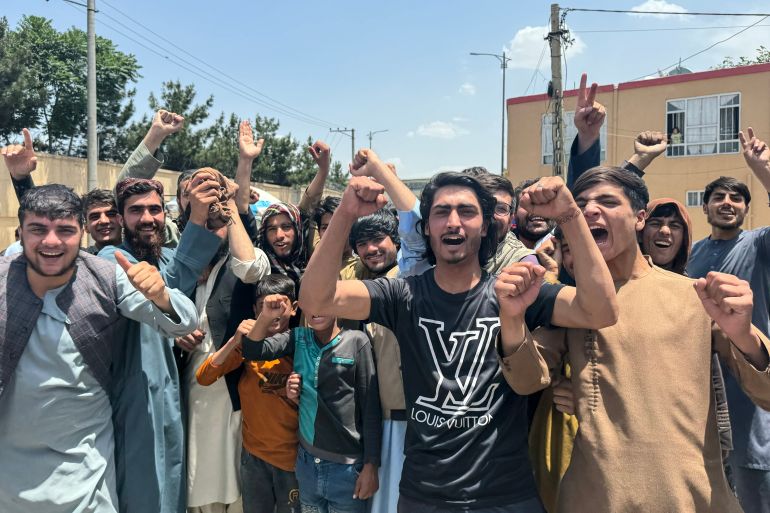 Afghan cricket fans celebrate their team's victory