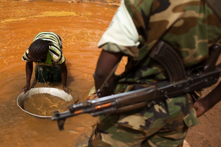 A soldier and a gold miner in CAR