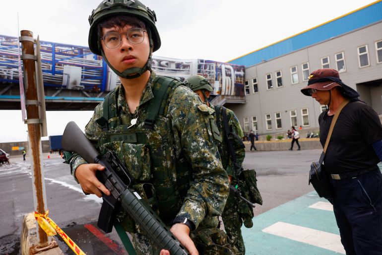 Soldiers participate in the 2024 National Defense Mobilization and Disaster Prevention and Rescue Drill, or Min-an drill in New Taipei City, Taiwan July 23, 2024. REUTERS/Ann Wang